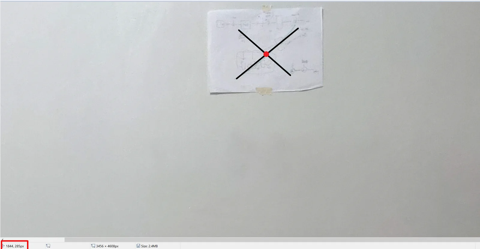 The wall photograph opened in an image editor to measure the two points in pixel coordinates